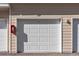 Closed white garage door at 4802 51St W St # 501, Bradenton, FL 34210