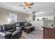 Comfortable living room with leather furniture and fireplace at 4802 51St W St # 501, Bradenton, FL 34210