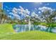 Serene pond with fountain in a lush landscape at 501 Haben Blvd # 303, Palmetto, FL 34221