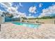 Relaxing community pool with surrounding patio at 501 Haben Blvd # 303, Palmetto, FL 34221