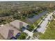 Aerial view of house showcasing a waterfront location and neighborhood context at 5213 Asher Ct, Sarasota, FL 34232