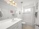 Clean bathroom with tub, shower, and vanity at 5213 Asher Ct, Sarasota, FL 34232