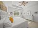 Main bedroom with king-size bed and dresser at 5213 Asher Ct, Sarasota, FL 34232