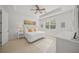Spacious bedroom with a queen-size bed and en-suite bathroom at 5213 Asher Ct, Sarasota, FL 34232