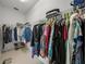 Walk-in closet with ample hanging space and shelving at 5213 Asher Ct, Sarasota, FL 34232