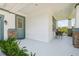 Front porch with wicker chairs offering a view of the water at 5213 Asher Ct, Sarasota, FL 34232