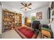 Home office features built-in shelves, desk, and window with a view at 5213 Asher Ct, Sarasota, FL 34232