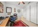 Spacious home office with wood desk, comfortable chair, and ample storage at 5213 Asher Ct, Sarasota, FL 34232