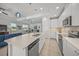 Open concept kitchen with island and breakfast bar, stainless steel appliances at 5213 Asher Ct, Sarasota, FL 34232