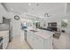 Open concept kitchen with large island and breakfast bar at 5213 Asher Ct, Sarasota, FL 34232