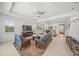 Open living space with comfortable seating and access to kitchen at 5213 Asher Ct, Sarasota, FL 34232