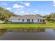 Single-story home showcasing a water view at 5213 Asher Ct, Sarasota, FL 34232