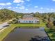 Single story home with water view and grassy backyard at 5213 Asher Ct, Sarasota, FL 34232