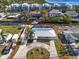 Aerial view of a single-story home with private boat dock and canal access at 524 Palm Ave, Ellenton, FL 34222