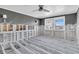 Unfinished bedroom undergoing renovation, showing exposed framing and flooring at 524 Palm Ave, Ellenton, FL 34222