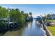 Scenic canal view with boats and lush foliage at 524 Palm Ave, Ellenton, FL 34222