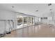 Renovation project: large living area with pool access, exposed framing at 524 Palm Ave, Ellenton, FL 34222