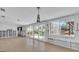 Large living area with pool view, currently under renovation at 524 Palm Ave, Ellenton, FL 34222