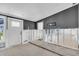 Under construction, open concept living space with new door and gray wall at 524 Palm Ave, Ellenton, FL 34222