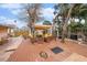 Large backyard deck with seating area and pergola at 550 80Th Ave, St Pete Beach, FL 33706