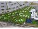 Aerial view of a vibrant outdoor putting green at 5697 Sheffield Greene Cir # 51, Sarasota, FL 34235