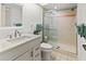 Bathroom with shower, toilet and updated vanity at 5697 Sheffield Greene Cir # 51, Sarasota, FL 34235