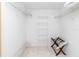 Walk-in closet with wire shelving and ample storage at 5697 Sheffield Greene Cir # 51, Sarasota, FL 34235