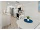 Kitchen with a casual dining area, white table and chairs at 5697 Sheffield Greene Cir # 51, Sarasota, FL 34235