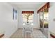 Small dining area with white table and chairs at 5697 Sheffield Greene Cir # 51, Sarasota, FL 34235