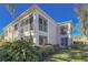 Well-maintained condo building with lush landscaping at 5697 Sheffield Greene Cir # 51, Sarasota, FL 34235