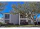 Two-story condo with mature trees and manicured lawn at 5697 Sheffield Greene Cir # 51, Sarasota, FL 34235
