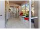 Outdoor patio with seating area, screened for privacy at 5697 Sheffield Greene Cir # 51, Sarasota, FL 34235