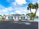 Community clubhouse with pool view at 5974 Hibiscus Dr # 06, Bradenton, FL 34207