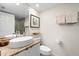 Bathroom with single vanity and a toilet at 61 Tidy Island Blvd, Bradenton, FL 34210