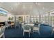 Bright community room with seating areas and fireplace at 61 Tidy Island Blvd, Bradenton, FL 34210