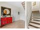 Entryway with staircase and decorative console at 61 Tidy Island Blvd, Bradenton, FL 34210