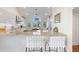 Modern kitchen with granite countertops and white cabinets at 61 Tidy Island Blvd, Bradenton, FL 34210