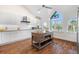 Spacious kitchen with island, hardwood floors, and stained glass window at 61 Tidy Island Blvd, Bradenton, FL 34210
