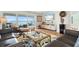 Bright living room with water views, comfortable seating, and stylish decor at 61 Tidy Island Blvd, Bradenton, FL 34210