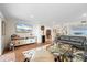 Living room with hardwood floors, comfortable seating, and water views at 61 Tidy Island Blvd, Bradenton, FL 34210