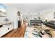 Living room with hardwood floors, comfortable seating, and water views at 61 Tidy Island Blvd, Bradenton, FL 34210