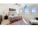 Bright and airy main bedroom with water views and sitting area at 61 Tidy Island Blvd, Bradenton, FL 34210