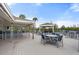 Spacious outdoor deck with seating and a gazebo at 61 Tidy Island Blvd, Bradenton, FL 34210