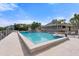 Community pool with surrounding lounge area at 61 Tidy Island Blvd, Bradenton, FL 34210