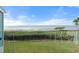 Stunning water view from private balcony, showcasing serene landscape at 61 Tidy Island Blvd, Bradenton, FL 34210