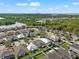 Aerial view of a house and neighborhood, showcasing the surrounding area and landscape at 7308 Tangle Bend Dr, Gibsonton, FL 33534