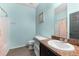Clean bathroom with a tub and vanity at 7308 Tangle Bend Dr, Gibsonton, FL 33534