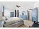 Spacious bedroom with dresser and large bed at 7308 Tangle Bend Dr, Gibsonton, FL 33534