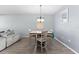 Bright dining room with light wood table and chairs at 7308 Tangle Bend Dr, Gibsonton, FL 33534