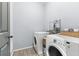 Bright laundry room with washer and dryer at 7308 Tangle Bend Dr, Gibsonton, FL 33534